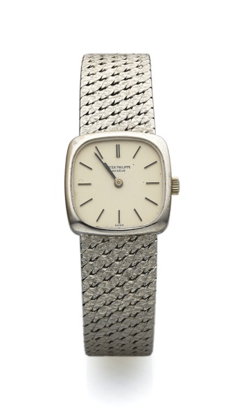 PATEK PHILIPPE REF. 4179 WHITE GOLD.Patek Philippe Cie, Genève, No. 1260812, case No..2718081, Ref. 4179/1. Made in the early 1990s..Fine, cushion-shaped, 18K white gold wristwatch with.an integral 18K white gold Patek Philippe textured mesh.