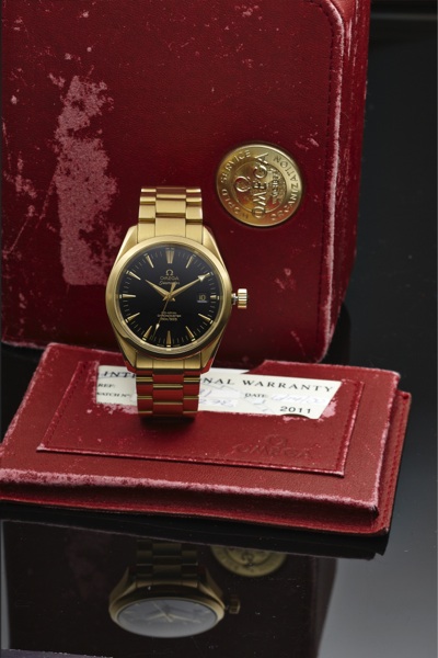 OMEGA SEAMASTER CO-AXIAL.AQUA TERRA YELLOW GULD.Omega, Chronometer, Seamaster - Aqua Terra, No. 80516077.Ref. 2500. Made circa 2006..Fine, center seconds, self-winding, water resistant to 150 m.18K yellow gold wristwatch with date, Co-axial esc