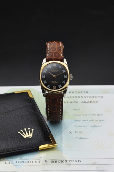 ROLEX CELLINI REF. 6229.QUARTZ PINK WHITE GOLD.Rolex, Genève, Cellini, case No. K676578, Ref. 6229. Made circa 2007..Fine, tonneau-shaped, 18K pink and white gold quartz wristwatch with an 18K white gold Rolex buckle. Accompanied by a service