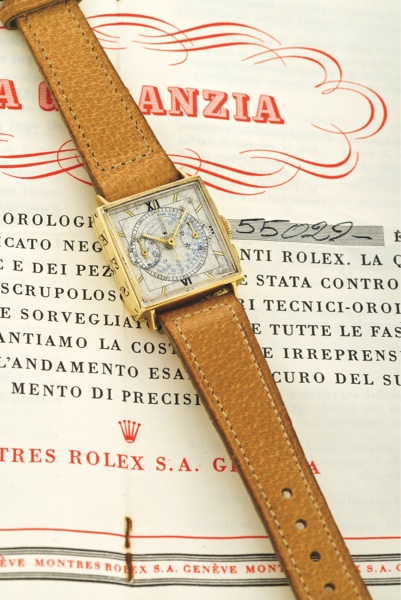 ROLEX REF. 3529, YELLOW GOLD SQUARE CHRONOGRAPH.Rolex, Ref. 3529. Case No. 55029. Made circa 1940..Very fine and extremely rare, square, 18K yellow gold.wristwatch with square button chronograph, register.tachometer and a yellow gold-plated Rol