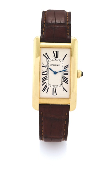 CARTIER REF. 1735 TANK AMERICAINE YELLOW GOLD.Cartier, Tank Américaine, case No. C69338, Ref. 1735-1. Made in the 1990s..Very fine, rectangular curved, 18K yellow gold wristwatch with an 18K yellow gold Cartier Buckle.