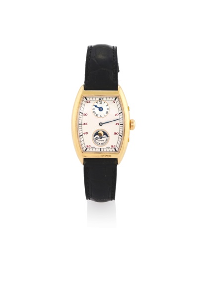 FRANCK MULLER YELLOW GOLD JUMP-HOUR MOON PHASE.Franck Muller, Genève, Cintrée Curvex, No. 16, Ref. 7500 DS L. Made in a limited.series circa 2000..Very fine, tonneau-shaped, water-resistant, jump-hour, two-time-zone, 18K yellow.gold wristwatc