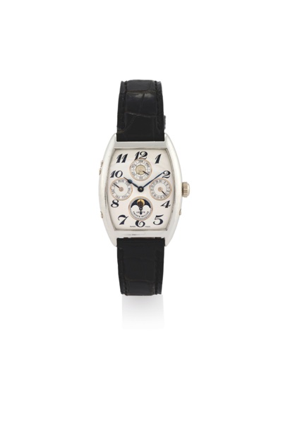 FRANCK MULLER REF. 7500 QP PLATINUM PERPETUAL CALENDAR.Franck Muller, Genève, Perpetual Calendar, No. 07, Ref. 7500 QP. Made circa 2000..Very fine and very rare, tonneau-shaped, curved, platinum wristwatch with perpetual.calendar, moon phases a