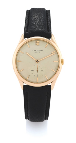 PATEK PHILIPPE REF. 2557 PINK GOLD.Patek Philippe, Genève, No. 751135, case No. 2613672, Ref. 2557. Made circa 1965..Fine and rare, thin, 18K pink gold wristwatch with a Patek Philippe pink buckle.