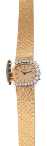 Patek Philippe Ref. 4105/1 DIAMOND SAPPHIRE YELLOW. GOLD. Patek Philippe, Geneve, No. 1247310, case No. 2682084. Ref. 4105/1. Made in the early 1970’s.. Very fine and elegant, horizontal oval, 18K yellow gold, diamond and. sapphire lady’s wristwatch wit
