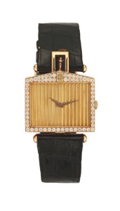 Coru m For Rolls ROYCE. YELLOW GOLD AND DIAMOND. Corum, Spirit of Ecstasy, Rolls Royce. Made in the 1980s.. Fine and unusual 18K yellow gold and diamond wristwatch with. gold plated Corum buckle.