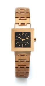 BVLGARI REF. SQ 22 G. QUADRATO YELLOW GOLD. Bvlgari, “Quadrato”, case No. F011, Ref. SQ 22 G. Made in. the 1990’s.. Fine, square, 18K yellow gold wristwatch with 18K yellow. gold Bvlgari bracelet and concealed deployant clasp.