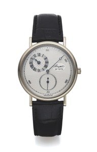 BREGUET REF. 3690 WHITE GOLD. Breguet, No. 6775, Ref. 3690. Made circa 1996.. Very fine and rare, 18K white gold wristwatch with. “regulator dial” and an 18K white gold Breguet buckle.