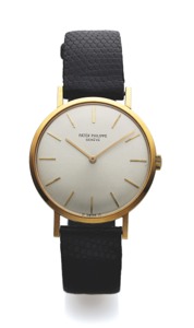PATEK PHILIPP E REF. 3537 YELLOW GOLD. Patek Philippe, Genève, No. 1220660, case No. 2733405. Ref. 3537. Made in 1971.. Fine and rare, elegant, 18K yellow gold wristwatch with. an 18K yellow gold Patek Philippe buckle.