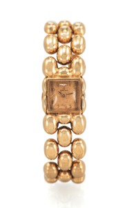 OMEGA GOLDEN NUGGET YELLOW GOLD. Omega, movement No. 10265015, case No. 1069327, Ref.. 7131. Made circa 1960.. Fine, and elegant, 18K yellow gold lady’s bracelet watch