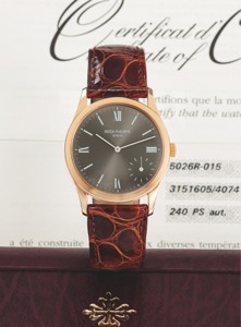 Patek Philippe Ref. 5026 Pink Gold. Patek Philippe, Genève, “Calatrava”, case No. 3150605, case No.. 4074118. Ref. 5026R-015. Made in 2001.. Very fine and rare, self-winding, water-resistant, 18K pink gold. wristwatch with offset seconds and an 18K pink g