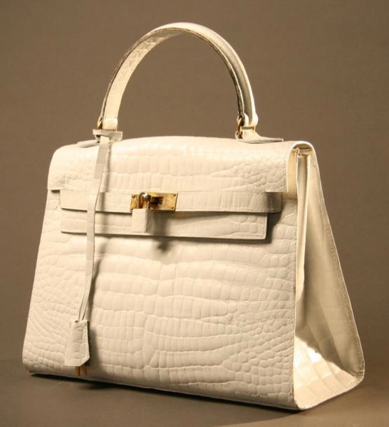 POURCHET POURCHET Sac en crocodile teinté blanc Avec son cadenas, sa clochette et - vente aux enchères 03/10/2012