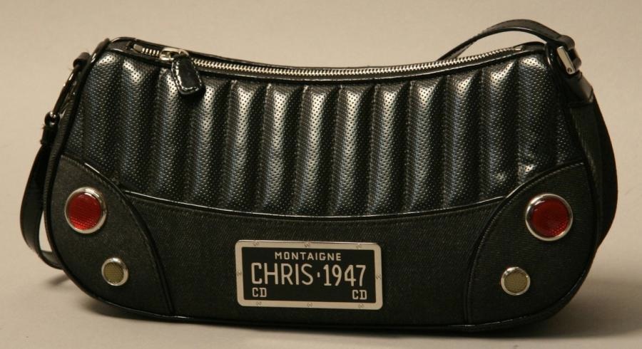 CHRISTIAN DIOR CHRISTIAN DIOR Sac MONTAIGNE CHRIS 1947 en cuir noir Anse porté épaule - vente aux enchères 03/10/2012