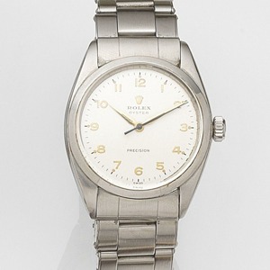 Precision, Ref:6427, Movement No.24790, Circa 1969 17-jewel manual wind movement, silvered dial with applied gilt Arabic numerals, black outer minute divisions with luminous dot five minute markers, gilt dagger hands with luminous inserts and blued steel 