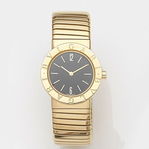 Ref:BB262T, Case No.P.52094, Sold 6th November 1989 Jewelled quartz movement, black dial with gilt baton hour markers and Arabic 6 and 12, gilt pointed baton hands, brushed and polished round case with snap on back, polished bezel signed Bulgari, integral