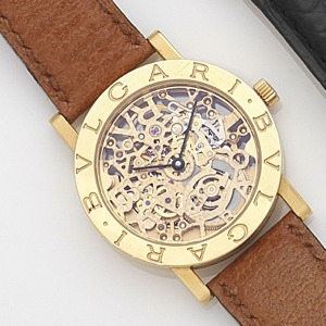 Ref:BB 33 GL SK P, Case No.P.2251, Circa 1995 21-jewel skeletonised automatic movement, black baton hands, brushed and polished round case with snap on exhibition back, bezel signed Bulgari, fitted tan brown Bulgari leather strap with signed buckle, case 