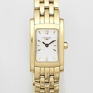 Dolce Vita, Ref:L5.158.6, Case No.30486935, Circa 2002 Jewelled quartz movement, white dial with applied gilt pointed baton hour markers and Arabic 6 and 12, gilt faceted sword hands, brushed and polished rectangular case with snap on back, fitted brick l