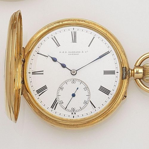 R S. Garrard Co. An 18ct gold keyless wind half hunter pocket watch