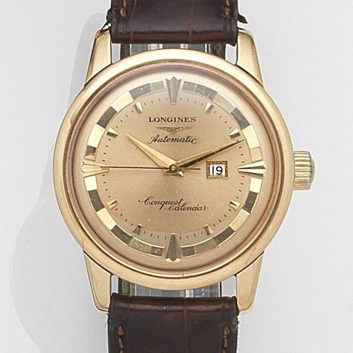 Longines. An 18ct gold automatic calendar wristwatch