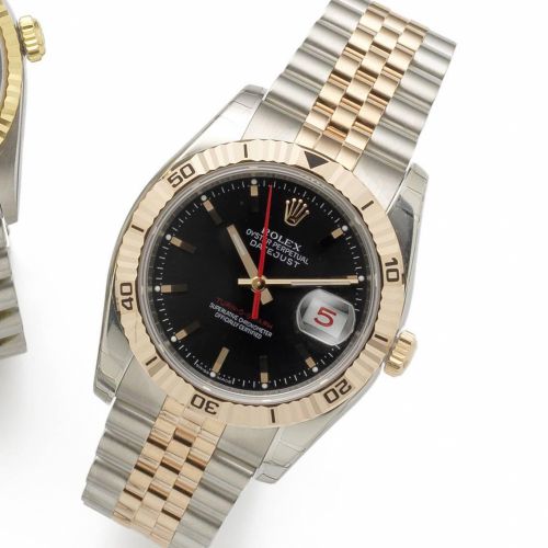 Rolex. A stainless steel and rose gold automatic calendar bracelet watch
