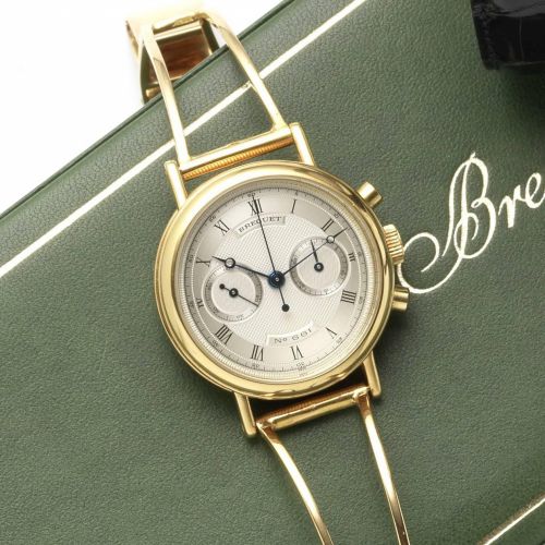 Breguet. An 18ct gold manual wind chronograph bracelet watch