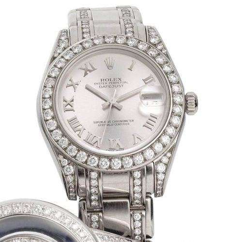 Rolex. A mid-sized 18ct white gold and diamond set automatic calendar bracelet watch together with Rolex box