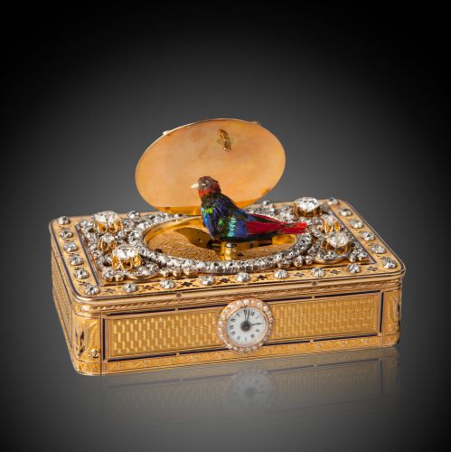 A fine and rare diamond-set engraved and enameled gold singing bird snuff box with musical movement and watch