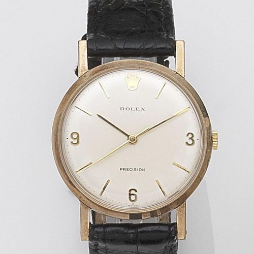 Rolex. A 9ct gold manual wind wristwatch