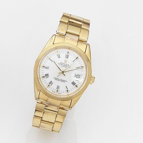 Rolex. A gold plated automatic calendar bracelet watch