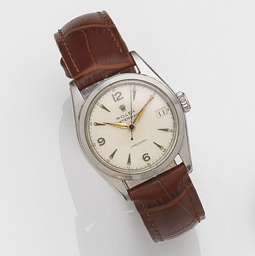 Rolex. A stainless steel manual wind calendar wristwatch with roulette date wheel