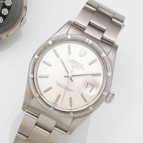 Rolex. A stainless steel automatic calendar bracelet watch