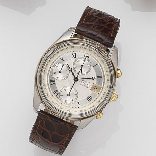 Girard Perregaux. A stainless steel and gold automatic calendar chronograph wristwatch