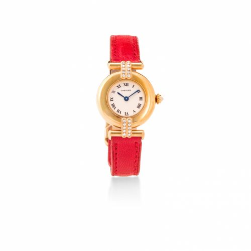 Cartier. An 18K gold and diamond-set lady's wristwatch