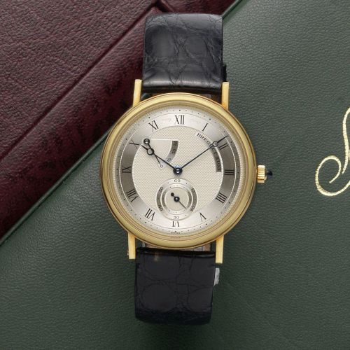 Breguet. An 18ct gold manual wind wristwatch with power reserve