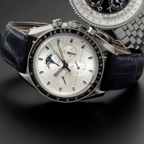 Omega. An 18ct white gold manual wind calendar chronograph wristwatch with moonphase