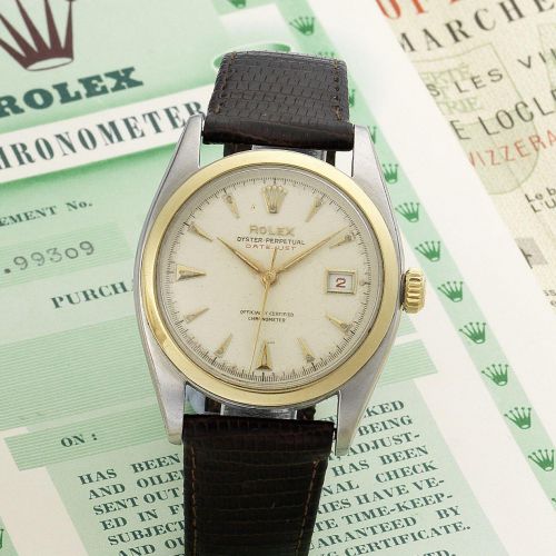 Rolex. A stainless steel automatic calendar wristwatch
