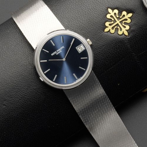 Patek Philippe. A fine 18ct white gold automatic calendar bracelet watch