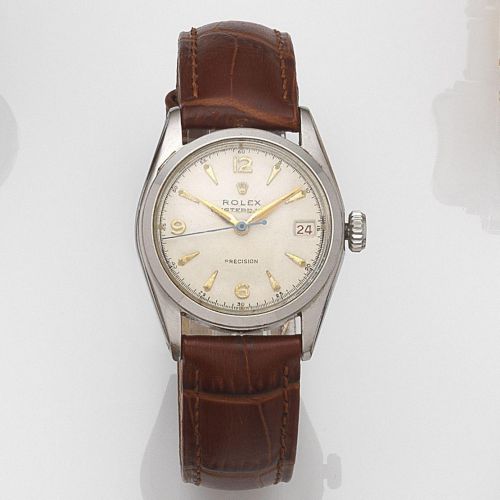 Rolex. A stainless steel manual wind calendar wristwatch with roulette date wheel