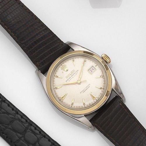 Rolex. A stainless steel automatic calendar wristwatch