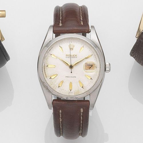 Rolex. A stainless steel manual wind calendar wristwatch