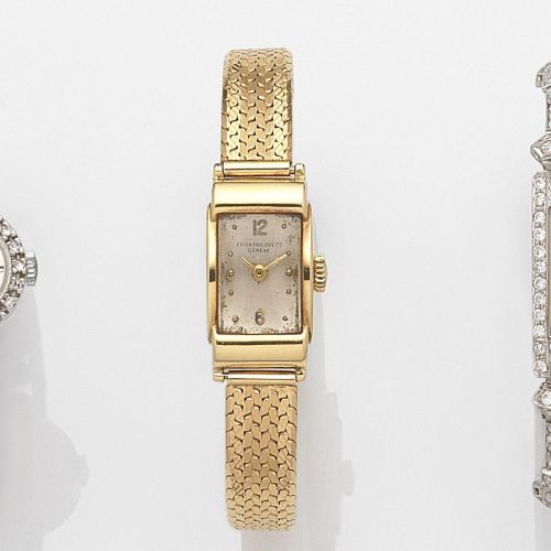 Patek Philippe. A lady's 18ct gold manual wind bracelet watch