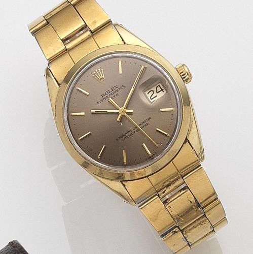 Rolex. A gold plated automatic calendar bracelet watch