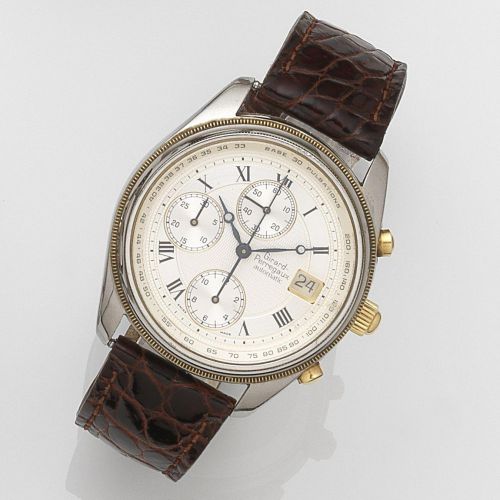 Girard Perregaux. A stainless steel and gold automatic calendar chronograph wristwatch