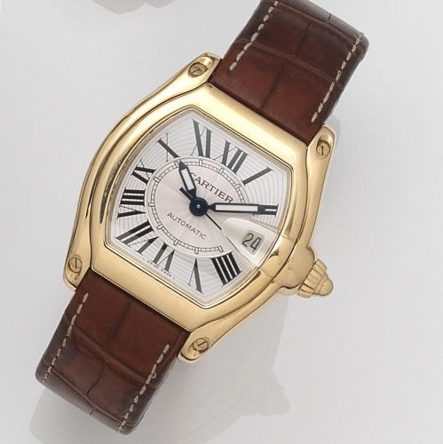 Cartier. An 18ct gold automatic calendar wristwatch
