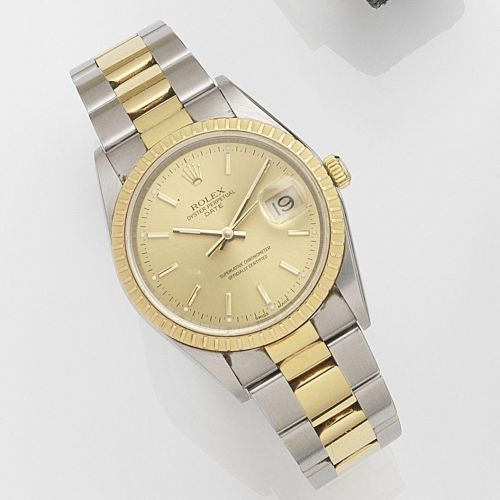 Rolex. A stainless steel and gold automatic calendar bracelet watch