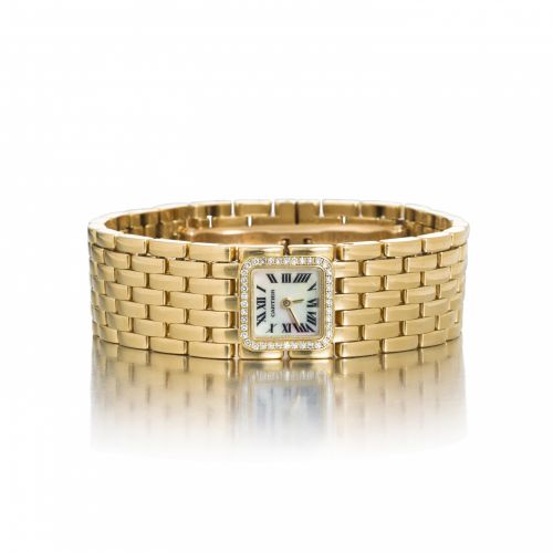 Cartier. A fine 18K gold and diamond lady's bracelet watch