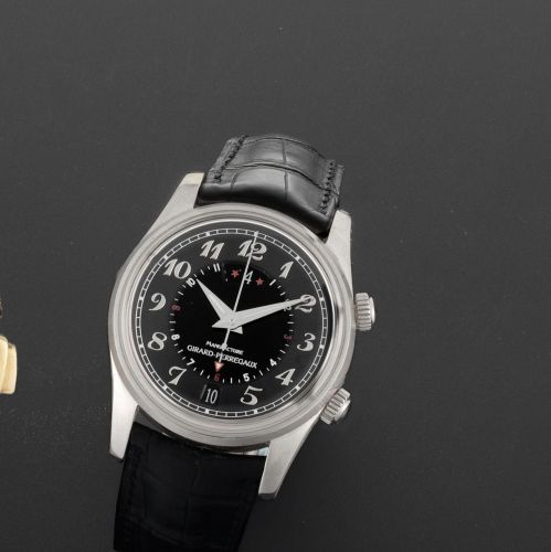 Girard-Perregaux. An 18ct white gold automatic calendar alarm wristwatch