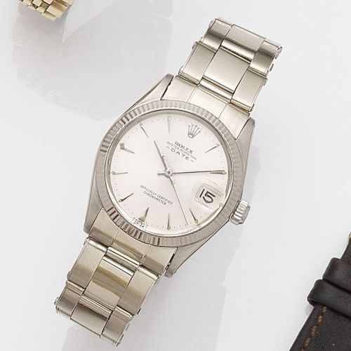 Rolex. A lady's 18K white gold automatic calendar bracelet watch