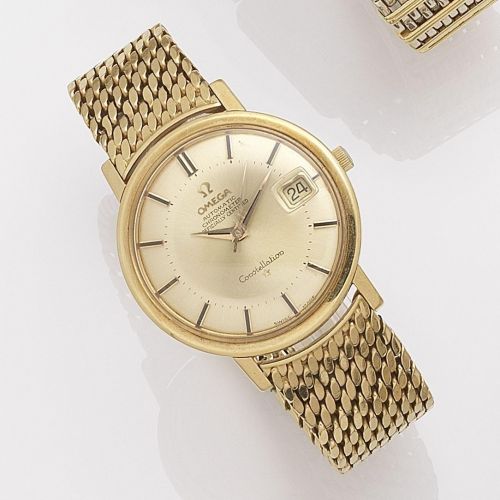 Omega. An 18k gold automatic calendar bracelet watch