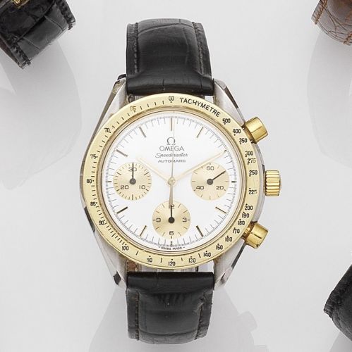 Omega. A stainless steel and gold automatic chronograph wristwatch